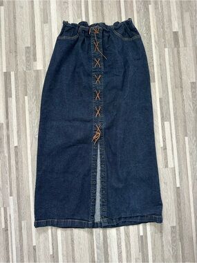 Starwear long skirt, 1990s, with a front slit and lace-up closure. Size 15/